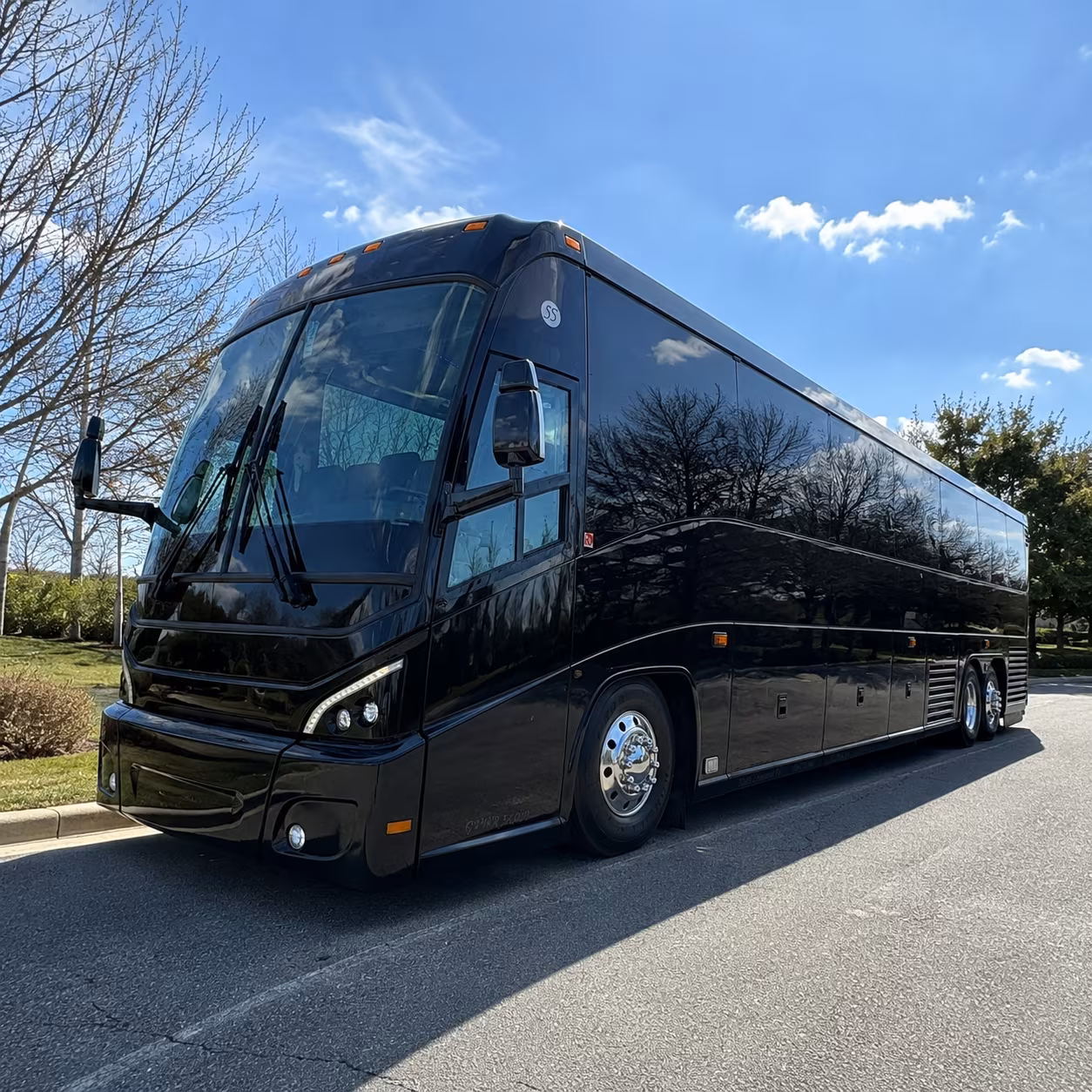 compare charter buses for federal agency transfers and court appearances in miami dade